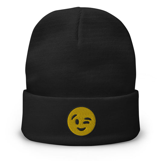Black cuffed beanie with Winking Face Emoji embroidered artwork, front view