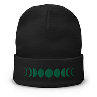 Black cuffed beanie with Moon Phases Lunar Cycle to Full Moon embroidered artwork, front view