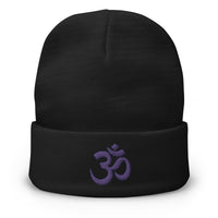 Black cuffed beanie with OM Sacred Spiritual embroidered artwork, front view