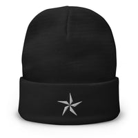 Black cuffed beanie with Nautical Star North Star embroidered artwork, front view
