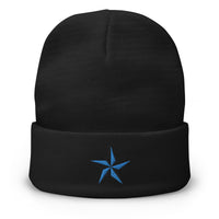 Black cuffed beanie with Nautical Star North Star embroidered artwork, front view