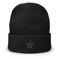 Black cuffed beanie with Nautical Star North Star embroidered artwork, front view
