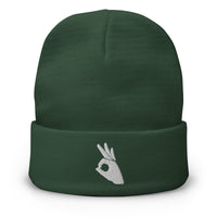 Green cuffed beanie with Okay Sign Hand Gesture embroidered artwork, front view