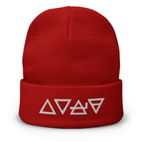 Red cuffed beanie with Fire Water Wind Earth The Four Elements of Matter embroidered artwork, front view
