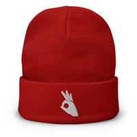 Red cuffed beanie with Okay Sign Hand Gesture embroidered artwork, front view